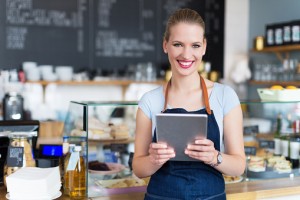 Woman working in coffee shop