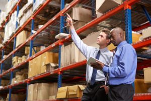 Two Businessmen In Cash Drawer Warehouse for channel sales