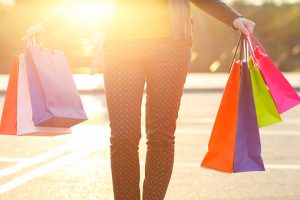 Woman holding her shopping bags in her hand