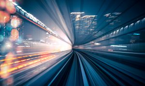 abstract motion-blurred view from the front of a train in Tokio, Japan