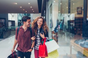 Happy couple in the shopping center