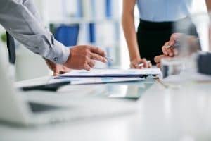 Hands of business people working with documents