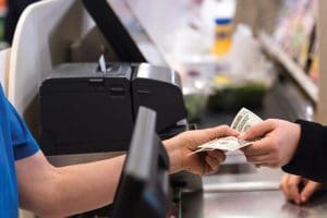 Cashier receiving money