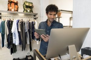 male owner in fashion store