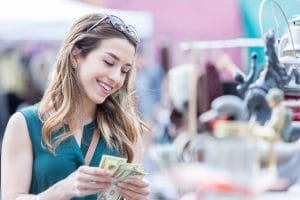 Woman paying with cash