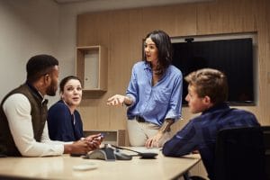 Shot of a businesswoman giving a presentation to her colleagues in an office